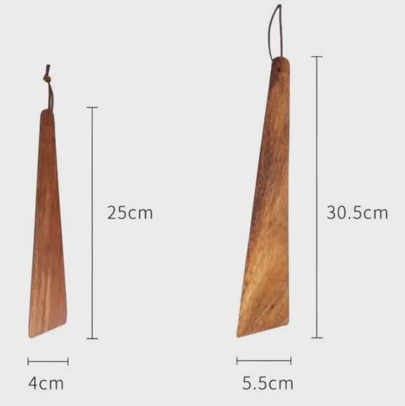 Two wooden tools with measurements on a light gray background