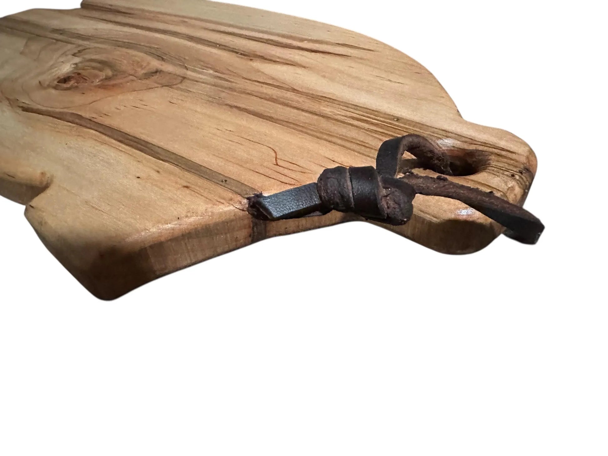 Wooden cutting board with a metal handle on a white background