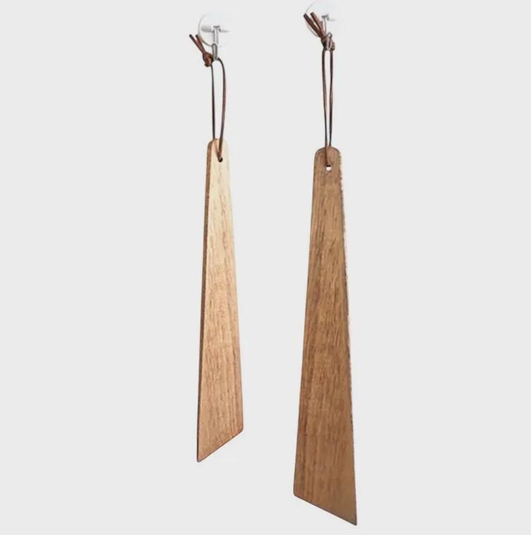 Pair of wooden earrings on a white background